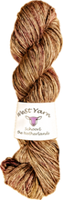Afbeelding in Gallery-weergave laden, WeStYarn Silky Singles skein in the light brown colorway Frappé. With red speckles
